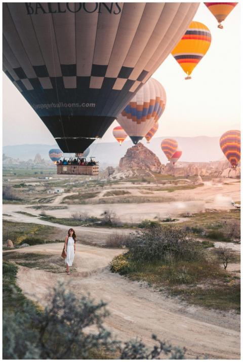 Hot air balloons soar above Cappadocia's unique la