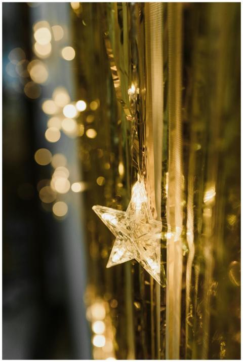 Elegant star-shaped decoration amidst warm bokeh l