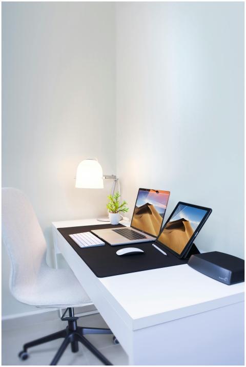 Stylish home office desk with dual screens and min