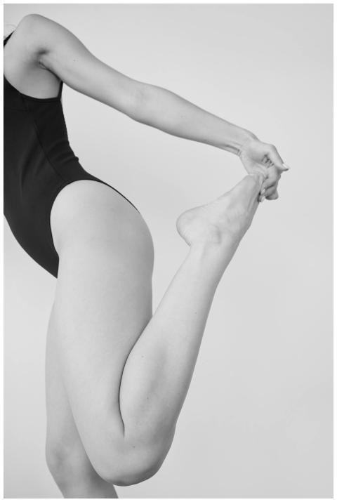 Artistic black and white photo of a woman in a str