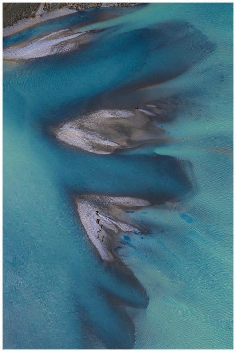 Stunning aerial shot showcasing unique blue water