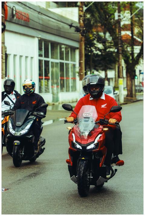 A group of motorcyclists on Honda motorcycles ridi