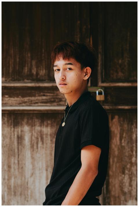 Youthful Portrait Against Rustic