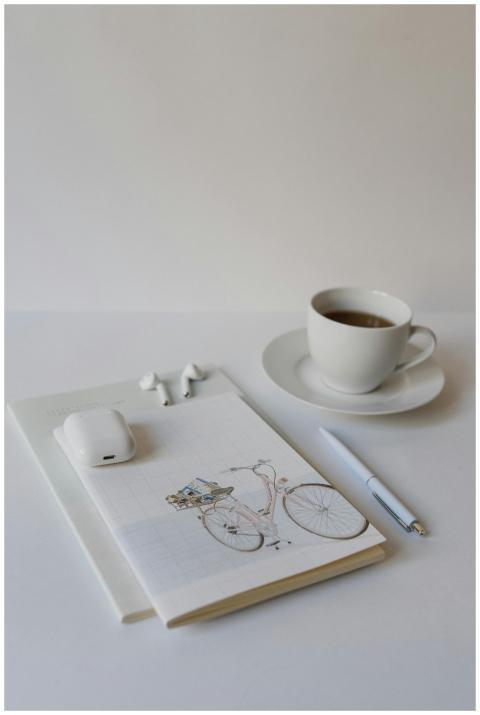 A minimalist still life featuring a coffee cup, no