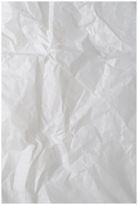 Close-up of crumpled white paper, perfect for back