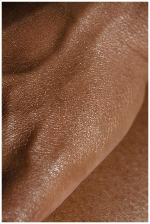 Closeup full frame hand of crop anonymous person w