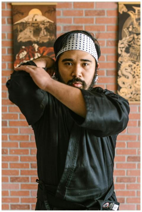 Portrait of a martial artist practicing techniques