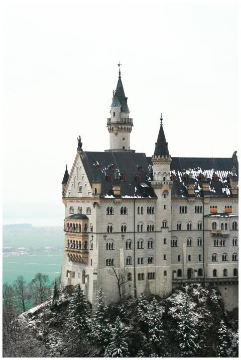 Stunning winter view of Neuschwanstein Castle surr