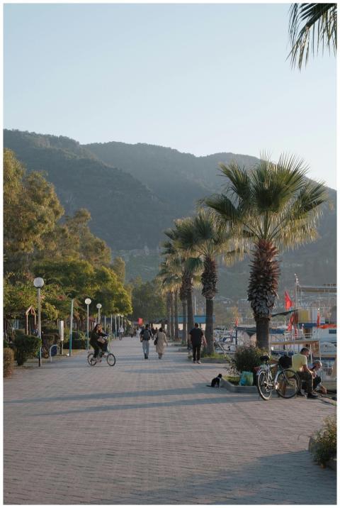 A tranquil walkway along the Fethiye marina with p