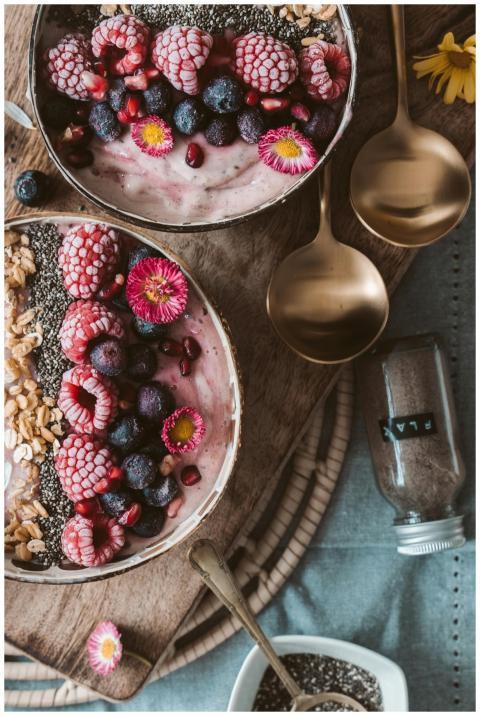 Delicious smoothie bowls topped with fresh berries