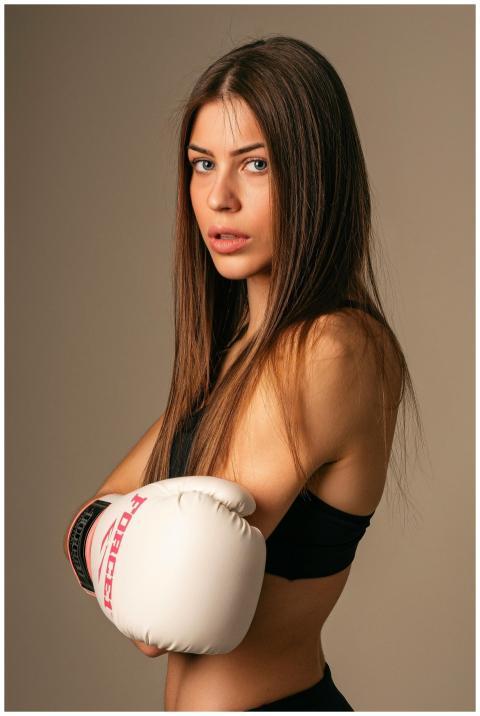 Studio portrait of a confident female boxer showca
