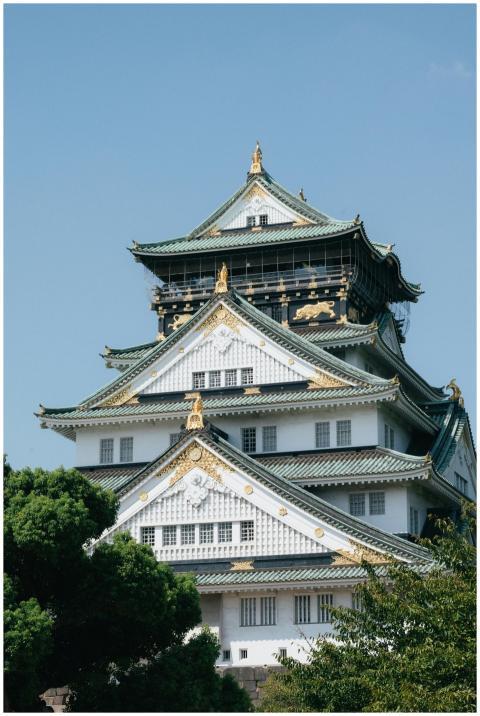 A stunning daytime view of Osaka Castle, showcasin