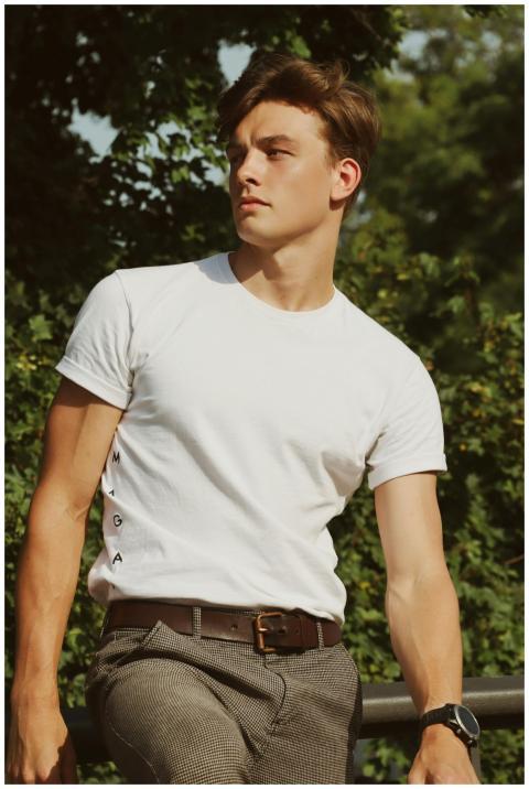 Fashion portrait of a male model with short hair i