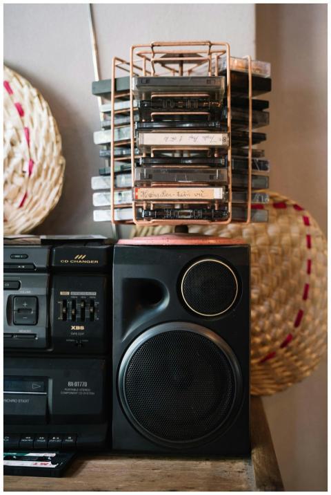 A nostalgic view of a vintage boombox and cassette