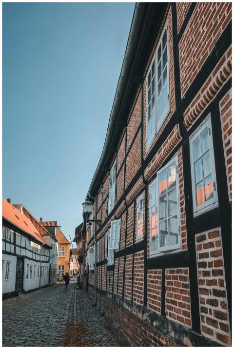 Explore the quaint cobblestone streets and traditi