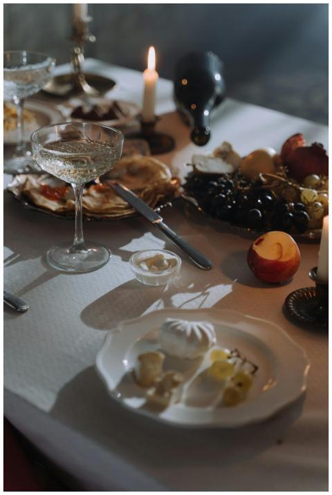 Charming dinner setting with fruits, cheese, and c