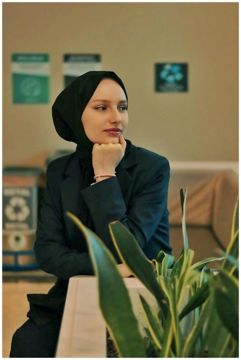 Portrait of a stylish businesswoman in a black sui