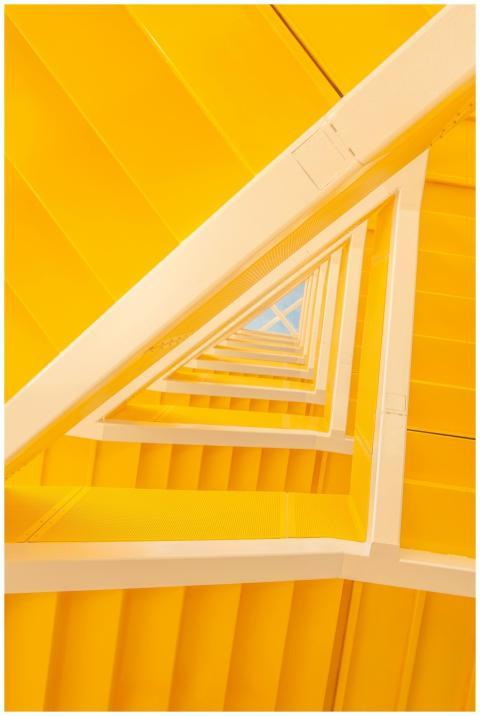 From below of modern geometric staircase made of y