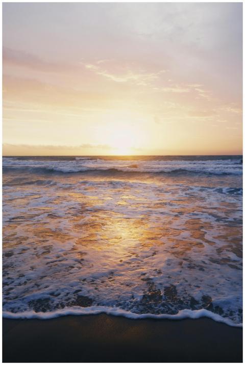 Capture the serene beauty of Bali's beach sunset w