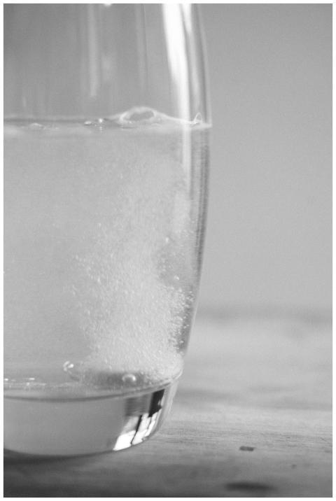 Black and white image of an effervescent tablet di