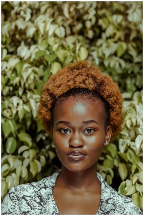 Portrait of a young woman with an afro hairstyle i