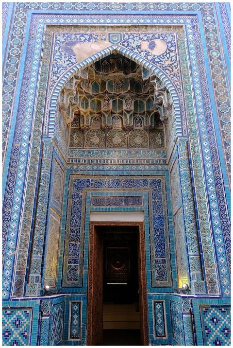 Intricate Persian-style archway with blue tile pat