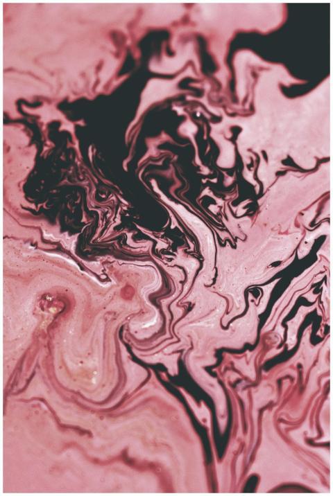 Vibrant abstract design with swirling pink and bla