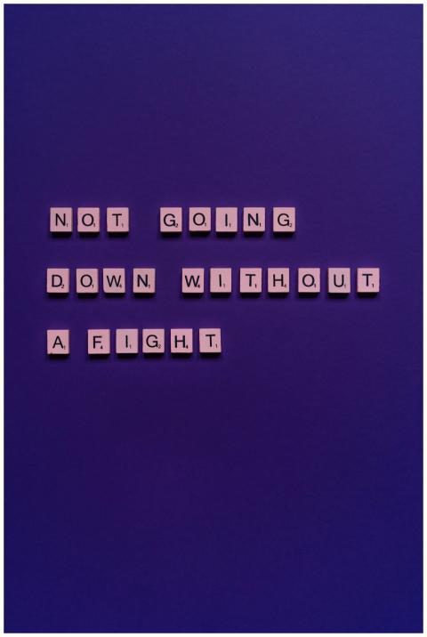 Motivational phrase 'Not going down without a figh