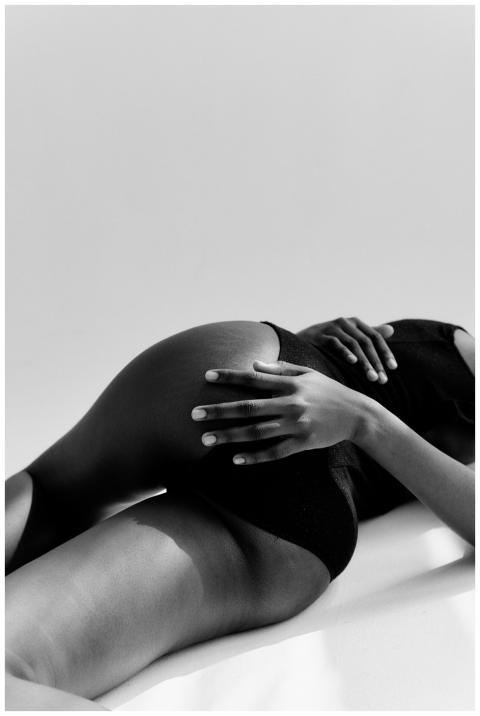 Elegant black and white studio shot featuring a mo