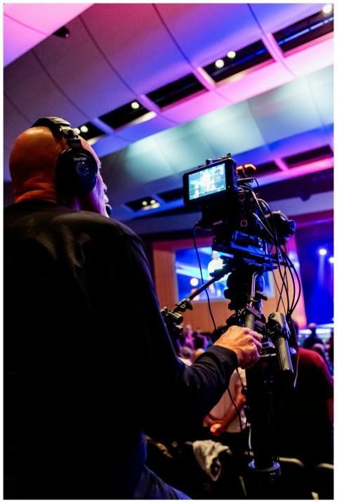 Cameraman Filming Live Event