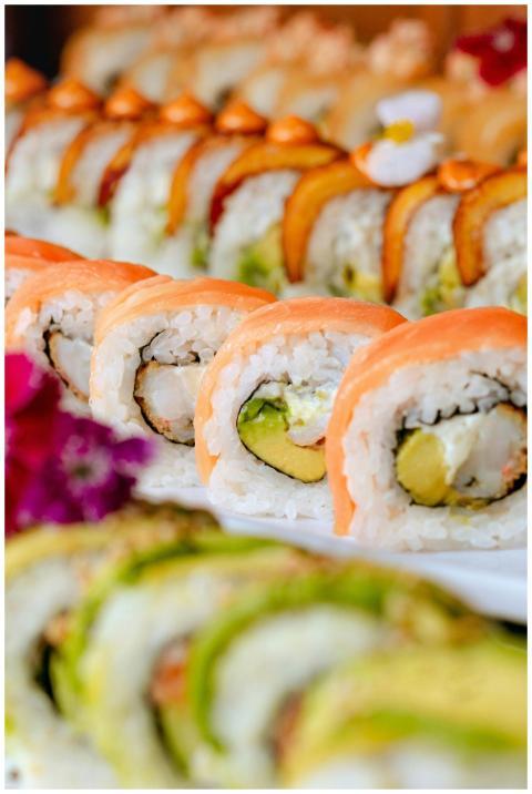 Delicious assortment of sushi rolls with salmon, a