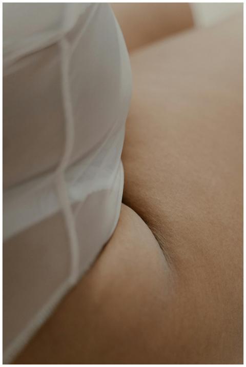 A close-up image of plus-size skin detail promotin