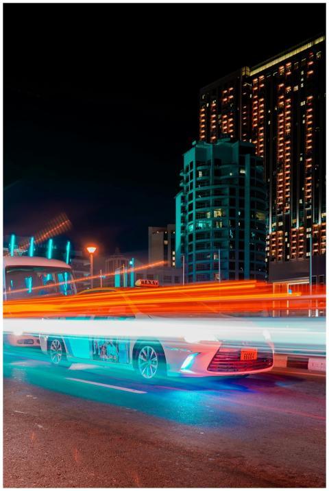 Long exposure of vibrant nighttime traffic against