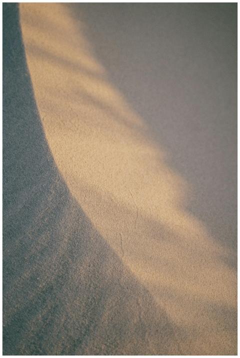 Close-up of sand texture with light and shadows cr