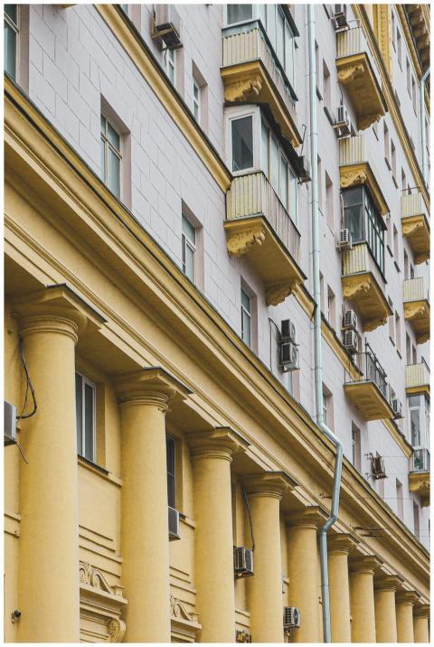 Elegant building facade with columns in Moscow, de
