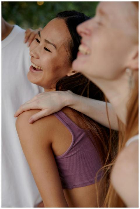 Capture of diverse group of friends laughing and b