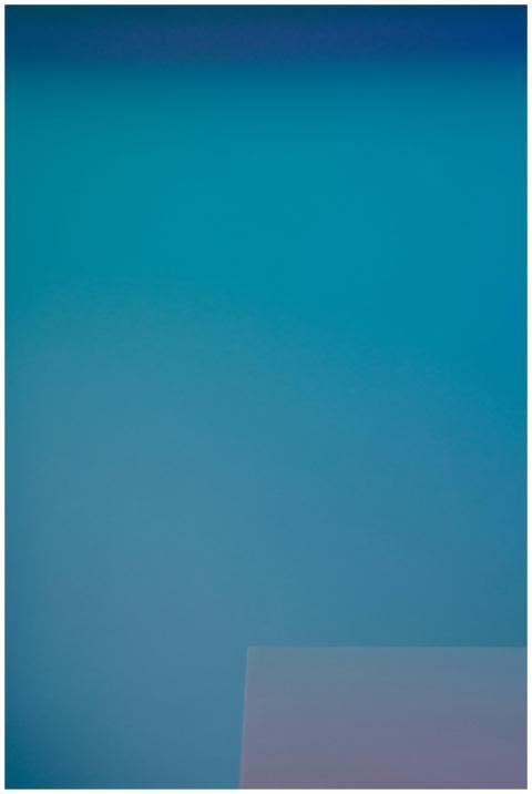 Minimalist image featuring a smooth blue gradient