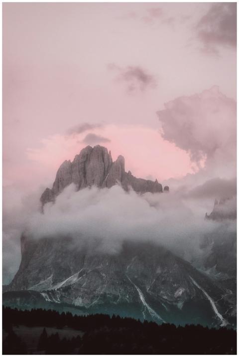 Breathtaking twilight view of a misty mountain pea