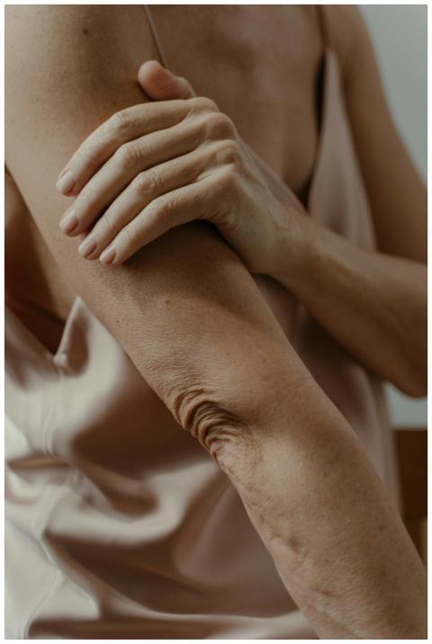 Close-up of a woman's arm showing graceful posture