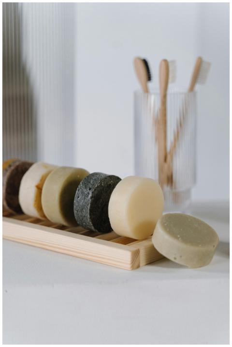Close-up of eco-friendly solid soap bars and woode