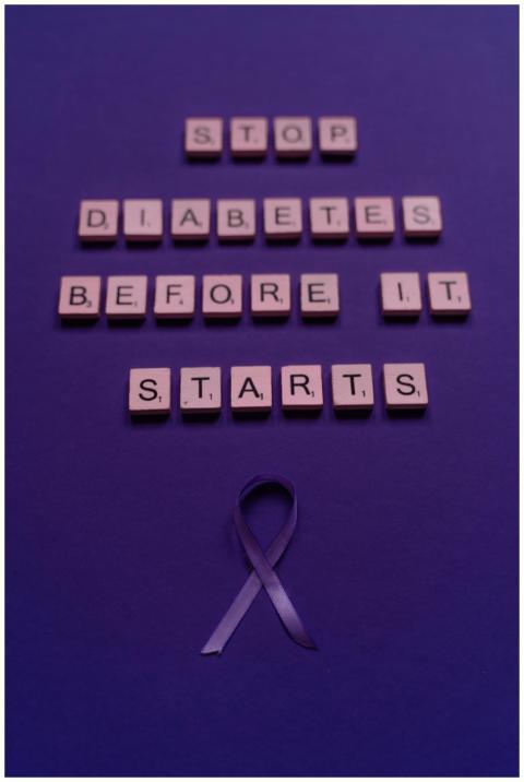 Wooden tiles spell 'Stop Diabetes Before It Starts