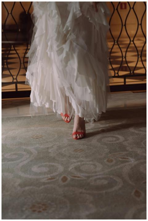 A stylish indoor photo capturing red high heels pe