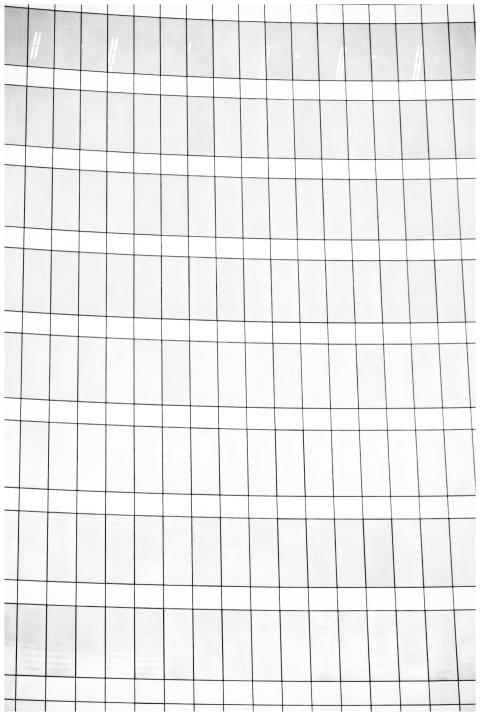 Sleek and modern skyscraper facade reflecting urba