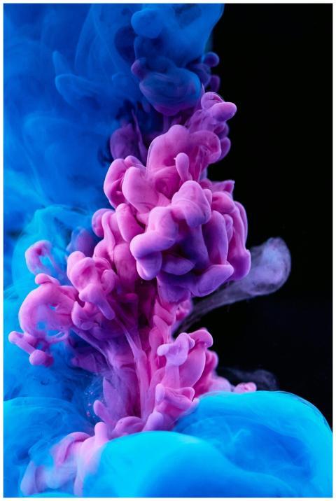 Stunning capture of colorful ink diffusing in wate