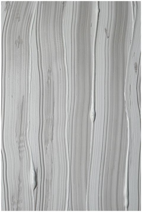 Close-up of a white textured surface with abstract