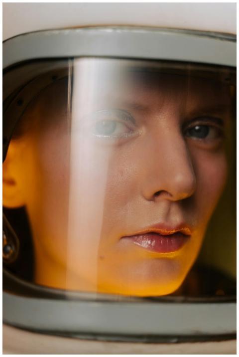 Detailed close-up of an astronaut's face inside a