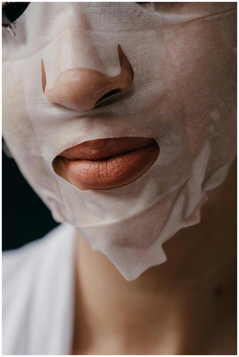 A close-up shot showing a woman's lips and nose co