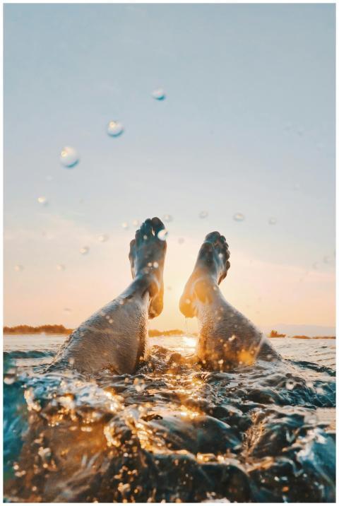 Enjoy a serene swim during sunset in Santa Cruz, I