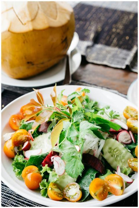 Healthy fresh salad with cucumbers, tomatoes, and