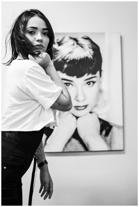 Artistic black and white portrait featuring a woma